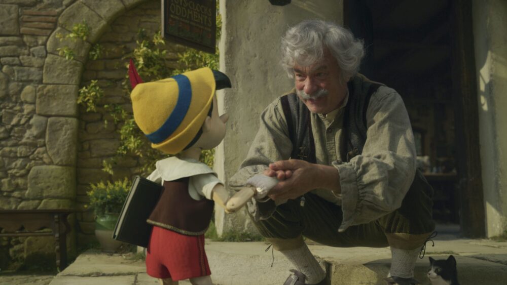 Pinocchio and Geppetto hold hands