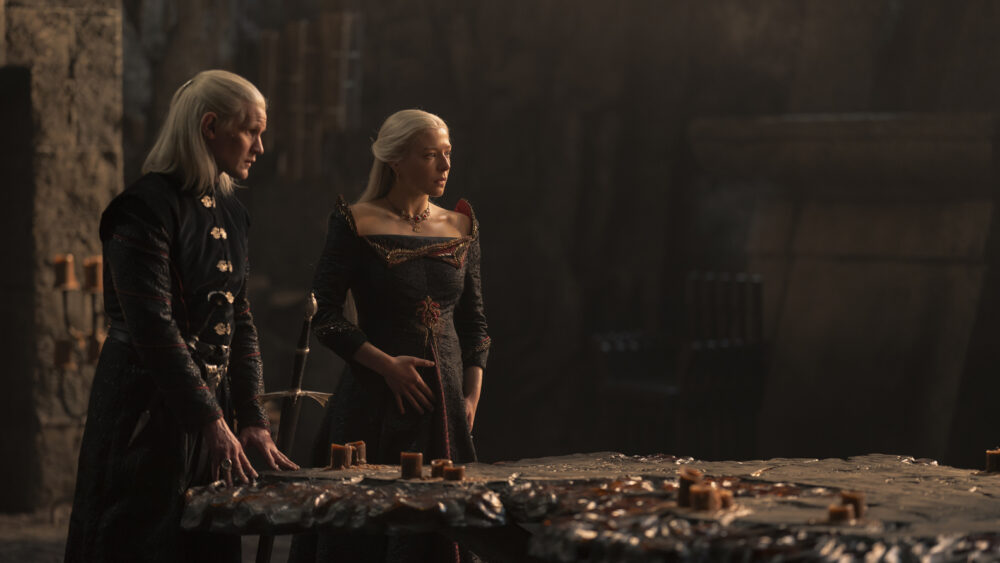 Daemon and Rhaenyra stand by the Painted table in house of the dragon the black queen
